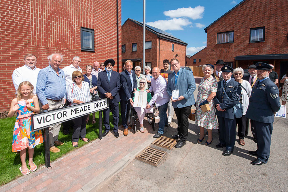  The event was attended by Local ward councillors (Cllr Bhupinder Gakhal (City of Wolverhampton Council Cabinet Member for City Assets and Housing), Cllr Greg Brackenridge and Cllr Andy Randle), Barry Meade and his family and friends. Darren Baggs, Director at WV Living. Ray Fellows, Simon Hamilton and members of the Wednesfield History Society and residents from The Marches, including Ruby Walters, aged 8.